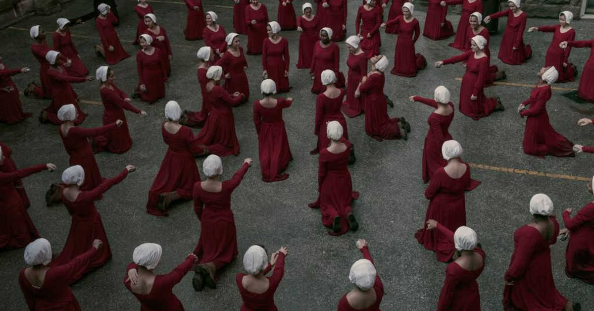 The handmaids of 'The Hand Maids' tale in a cirle