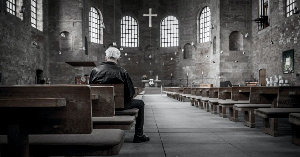 Man in an empty church